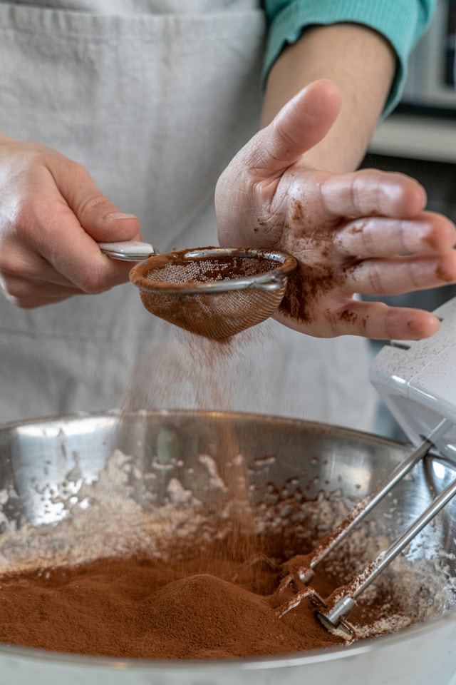 sifting cocoa powder